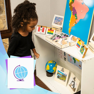 Young child in black shirt looking at Montessori continent map - Montessori science curriculum